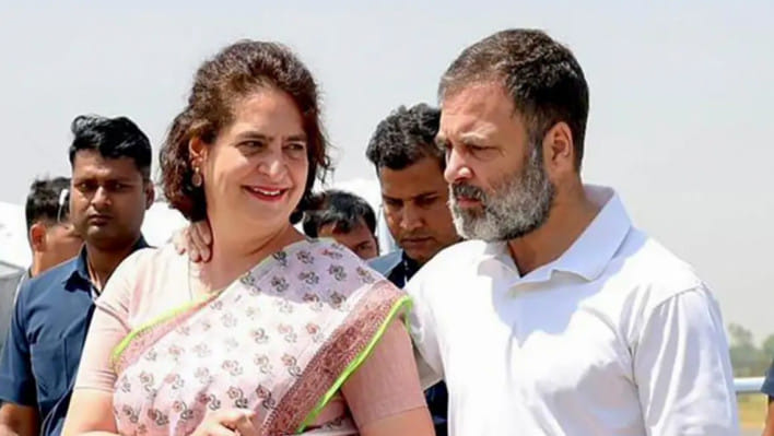 রাহুল গান্ধী ও প্রিয়াঙ্কা গান্ধী। ফাইল ছবি: এএফপি