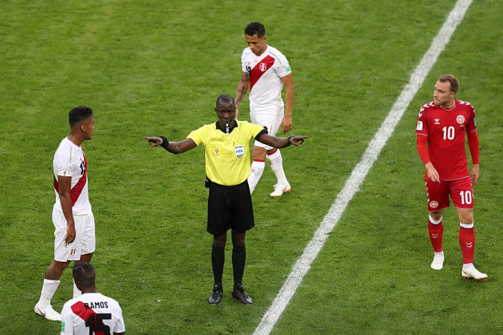 Referee Bakary Gassama calls for VAR (Video Assistant Referee) review Referee Bakary Gassama calls for VAR (Video Assistant Referee) review