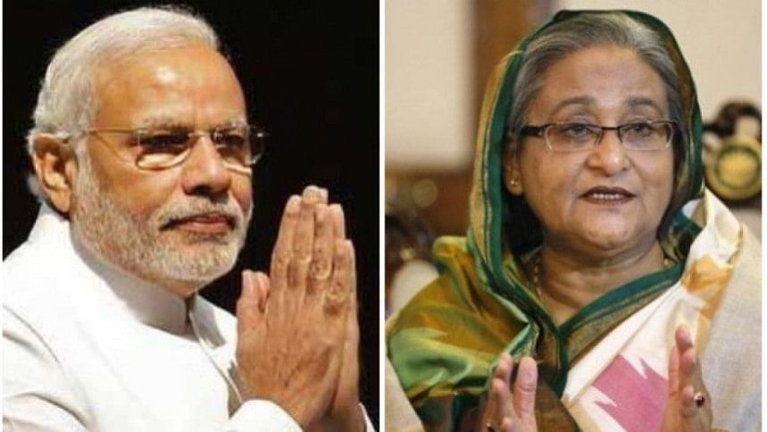 ভারতের প্রধানমন্ত্রী মোদি ও বাংলাদেশের প্রধানমন্ত্রী শেখ হাসিনা। ফাইল ছবি ভারতের প্রধানমন্ত্রী মোদি ও বাংলাদেশের প্রধানমন্ত্রী শেখ হাসিনা। ফাইল ছবি