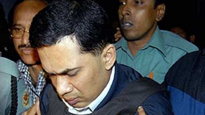 তারেক রহমানকে আদালতে হাজির করা হচ্ছে। ফাইল ছবি: এএফপি তারেক রহমানকে আদালতে হাজির করা হচ্ছে। ফাইল ছবি: এএফপি