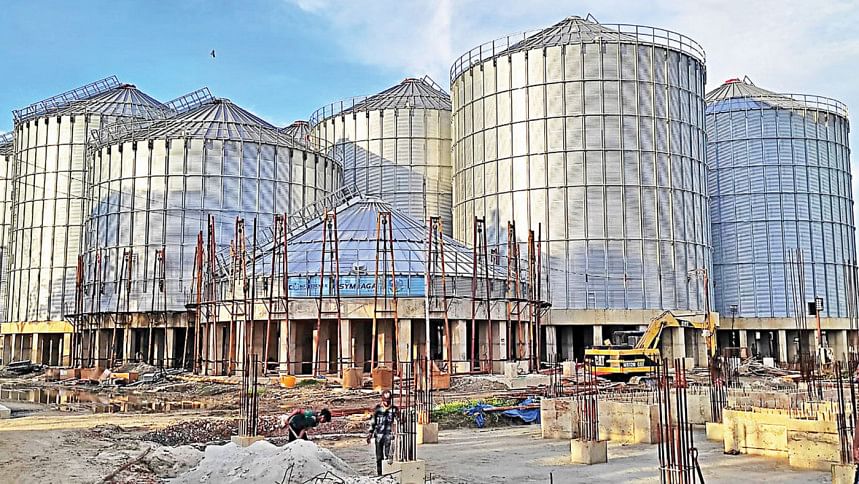 এক দশকে খাদ্য সংরক্ষণ প্রকল্পের অগ্রগতি অর্ধেক মডার্ন ফুড স্টোরেজ ফ্যাসিলিটিজ প্রজেক্ট, খাদ্য অধিদপ্তর, সাইলো, বেক্সিমকো, টেক মাহিন্দ্রা লিমিটেড, টেক ভ্যালি নেটওয়ার্কস লিমিটেড,