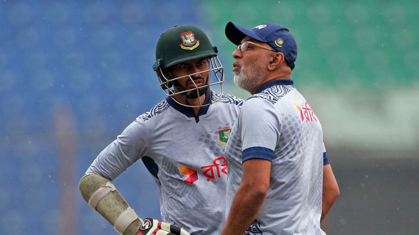 Taijul Islam & Chandika Hathurusingha Taijul Islam & Chandika Hathurusingha