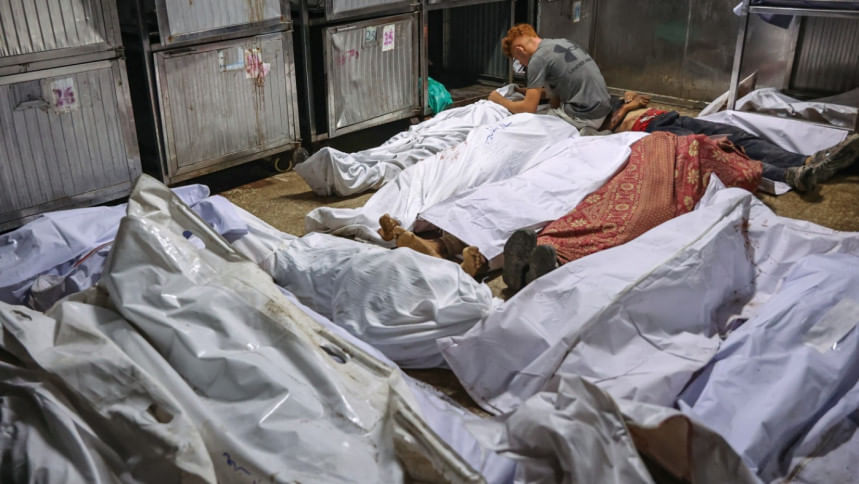 বেইত লাহিয়ায় ত্রাণ নিতে যেয়ে ইসরায়েলি সেনার গুলিতে নিহতদের মরদেহ। ছবি: এএফপি