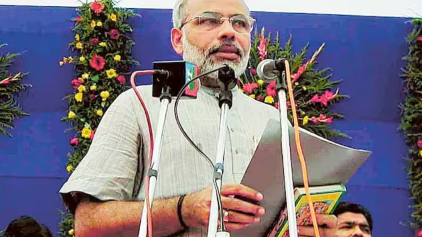 গুজরাটের মূখ্যমন্ত্রী হিসেবে শপথ নিচ্ছেন নরেন্দ্র মোদি। ফাইল ছবি: সংগৃহীত