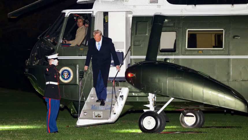 ফ্লোরিডায় ছুটি কাটিয়ে ওয়াশিংটন ফিরছেন ট্রাম্প। ছবি: এএফপি
