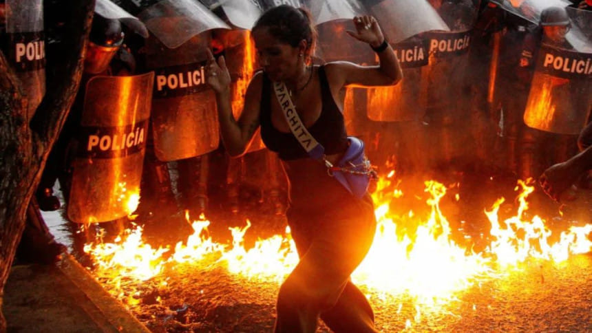 ভেনেজুয়েলায় যুক্তরাষ্ট্রের সম্ভাব্য হামলার বিরুদ্ধে কারাকাসে বিক্ষোভ। ছবি: রয়টার্স