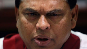 শ্রীলঙ্কার সাবেক অর্থমন্ত্রী বাসিল রাজাপাকসে। ফাইল ছবি: রয়টার্স