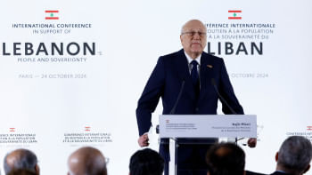 সম্মেলনে বক্তব্য রাখছেন লেবাননের প্রধানমন্ত্রী নাজিব মিকাতি। ছবি: রয়টার্স